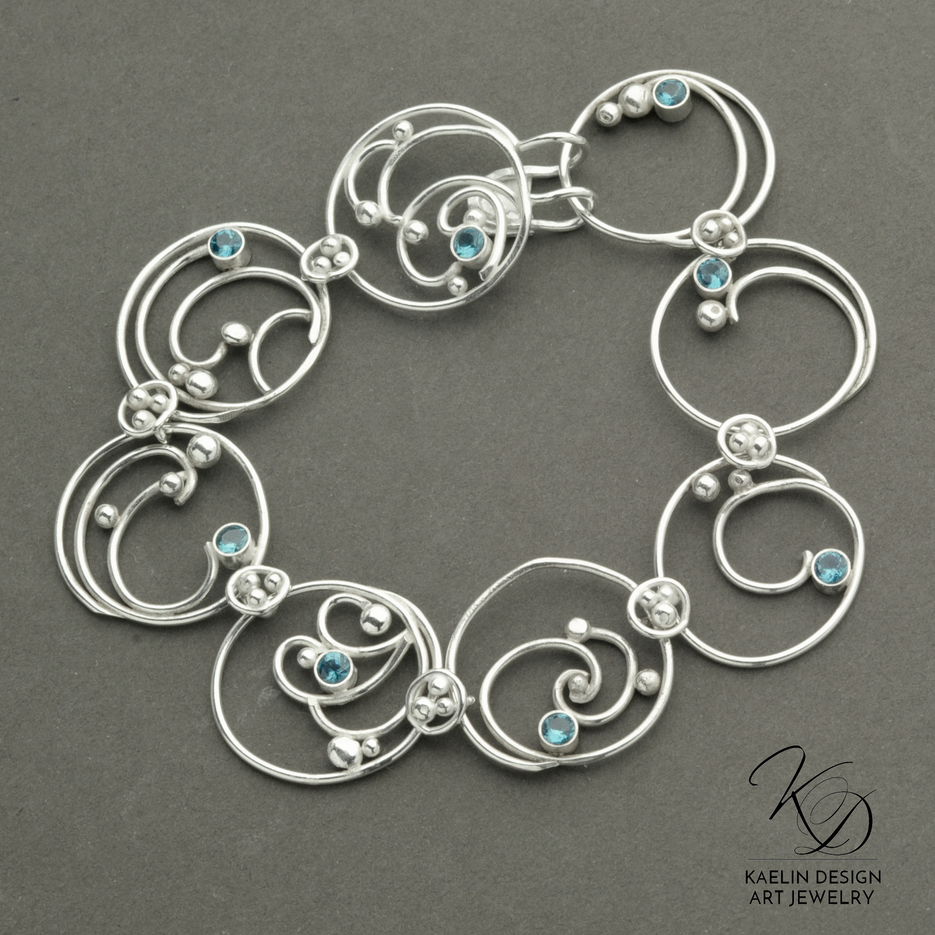 Hand Forged Sea Foam Silver Bracelet with London Blue Topaz by Kaelin Design Fine Art Jewelry